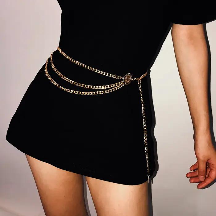 Chaîne de corps Ingemark en aluminium doré clair ou plaqué rhodium pour femmes, bijoux de style Vendange, bijoux de corps élégants et sophistiqués