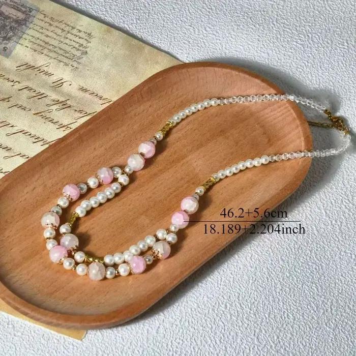 Collier à double rangée avec chaîne de perles en cristal rose