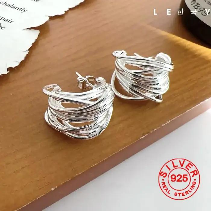 Boucles d'oreilles lignes Interware couleur argent pour femmes
