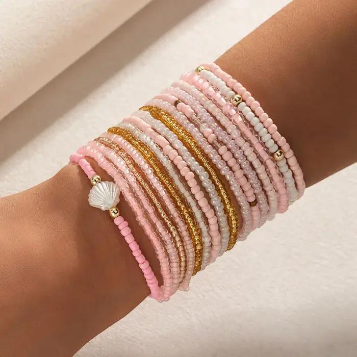 Lot de 17 bracelets en perles pastel pour femme