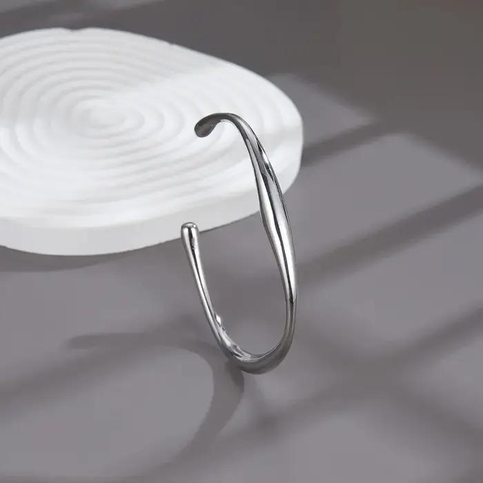 Bracelet simple et abstrait Mobis pour femme en acier inoxydable, bracelet ouvert irrégulier et élan