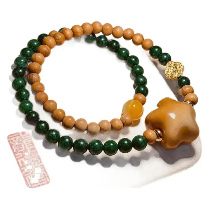 Bracelet double boucle en bois de pêcher style vintage avec perles de prière bouddhistes