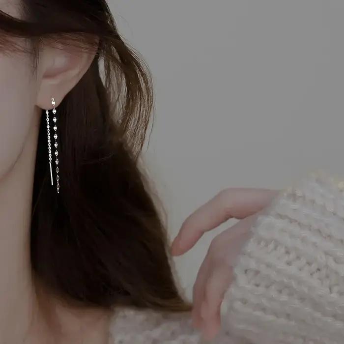 Boucles d'oreilles pendantes torsadées à sequins géométriques couleur argent pour femmes