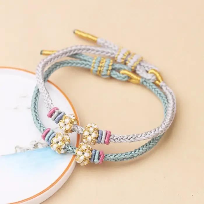 Bracelet ajustable tressé à la main motif fleur de pêcher nylon cordon perlé à huit brins pour femmes occasions spéciales DIY bijoux