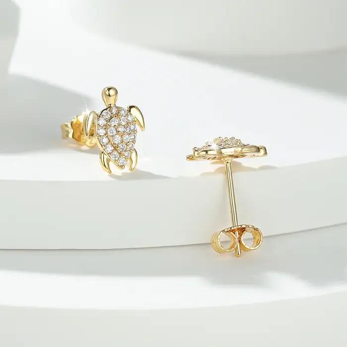 Boucles d'oreilles tortue de mer en cristal blanc pour femmes