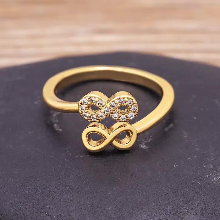 Bague Nidin en cuivre CZ arc-en-ciel pour femmes, design infini créatif, style hip-hop rock, bijou de fête, fiançailles et mariage réglable