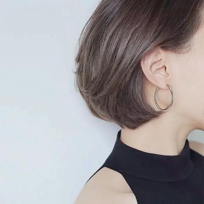 1 paire de boucles d'oreilles en acier inoxydable pour femmes