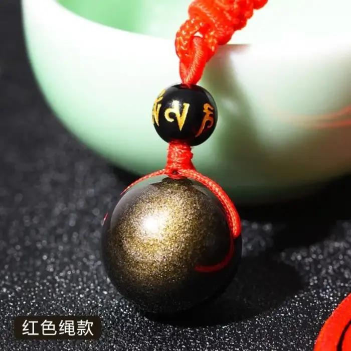 Pendentif en obsidienne dorée naturelle sculptée à la main pour hommes et femmes