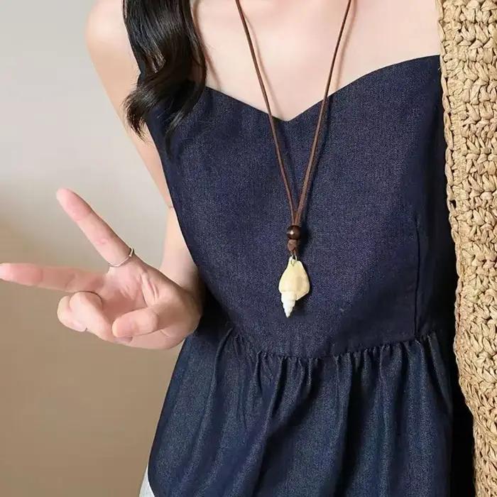 Collier pendentif coquillage style vacances en bord de mer