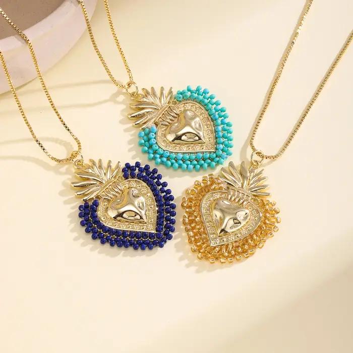 Nidin – collier avec pendentif en forme de cœur sacré