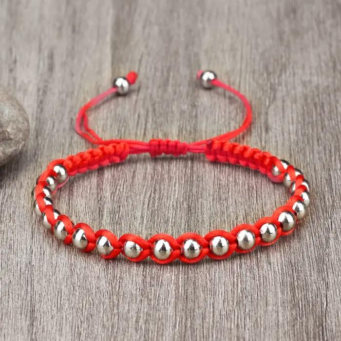 Bracelet Tressé Porte-Bonheur RaeRina en Corde Rouge et Perles en Cuivre Pour Homme et Femme Occasions Spéciales