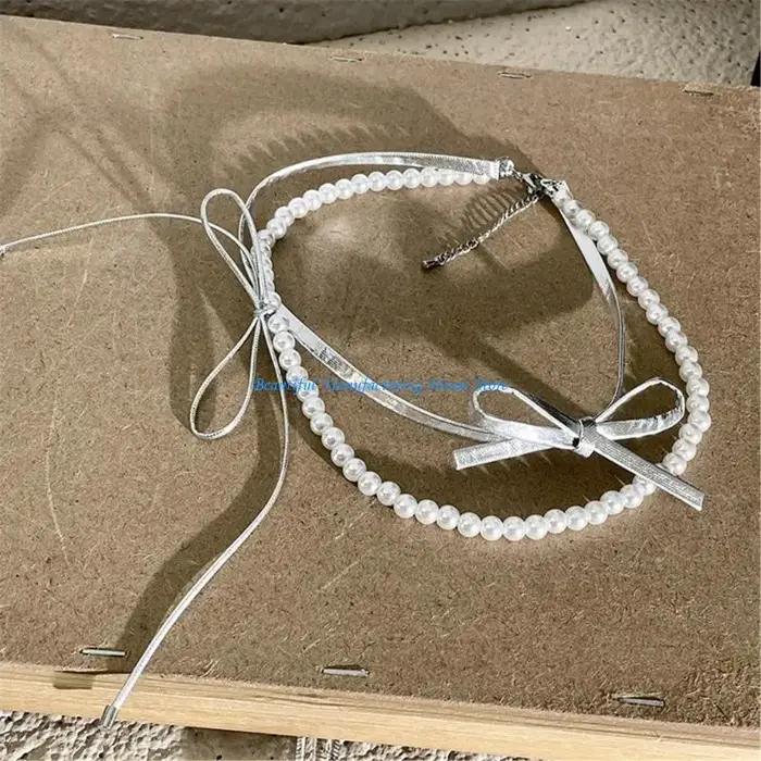 Collier élégant à nœuds papillons en cristal pour femmes, chaîne double couche, détails délicats, bijou empilable pour occasions spéciales