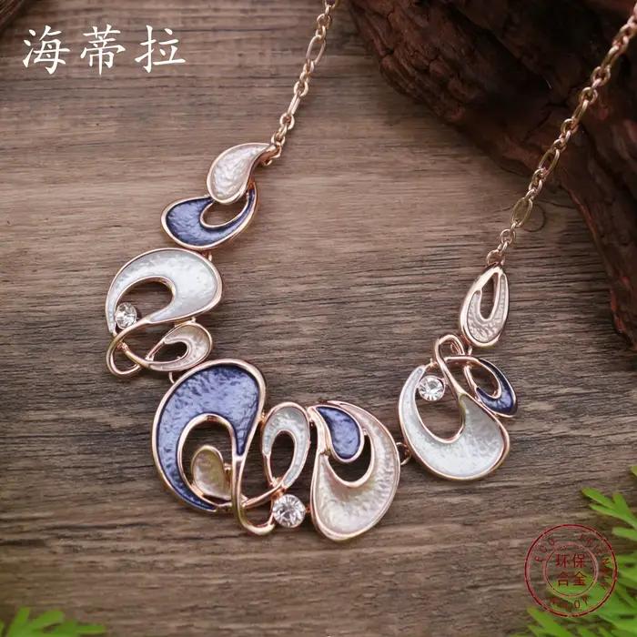 Nouveau collier fleur émaillée creuse en alliage