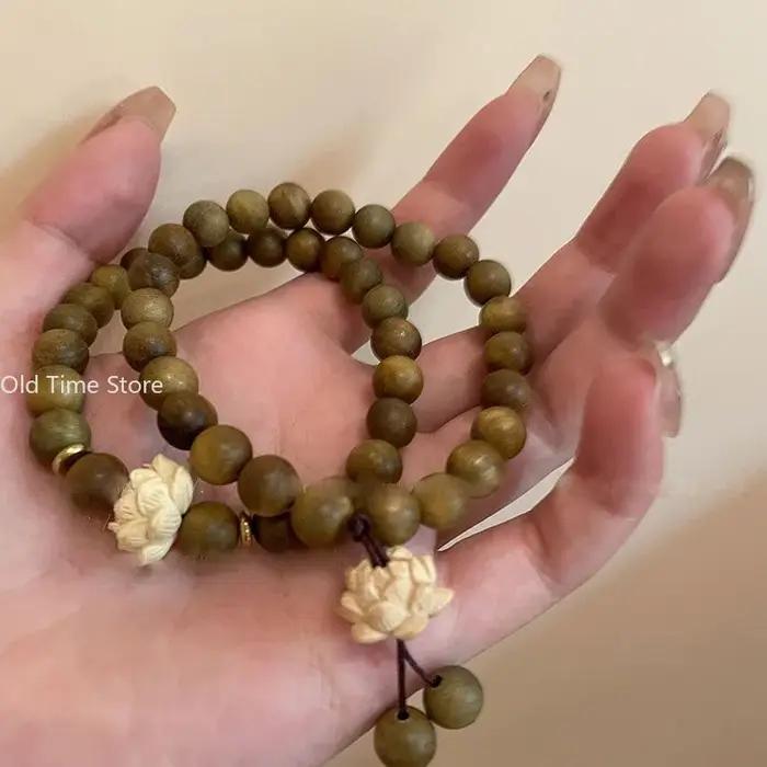 Bracelet de perles en bois réglable avec breloques style mode naturel élégant pour femme et homme en brun rougeâtre ou or jaune
