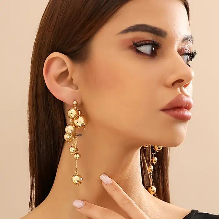 Boucles d'Oreilles Gothiques sulfà Pompons pour Femme