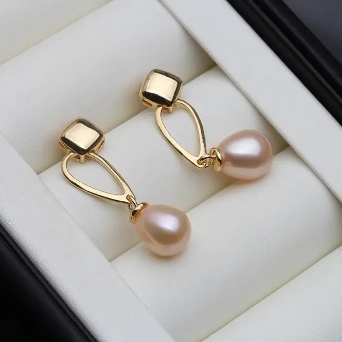 Boucles d'oreilles en perles noires véritable pour femme