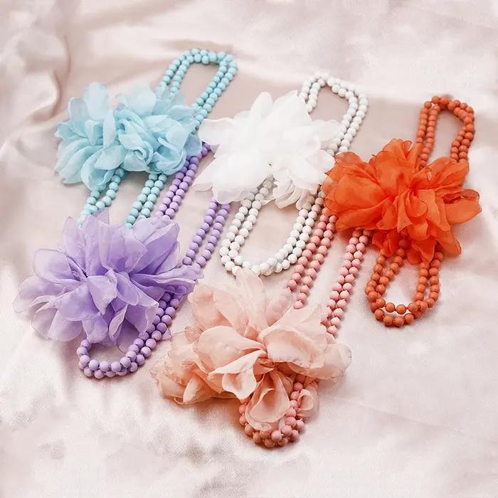 Collier long bohème élégant à grandes fleurs