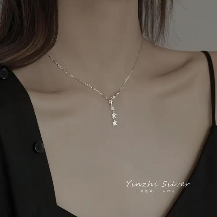 Collier étoile avec pendentif pompon en argent 2021