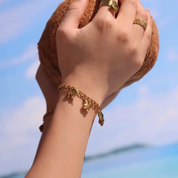 Bracelet à breloque en acier inoxydable pour femmes plaqué or éléphant mignon élégant pour occasions professionnelles et quotidiennes