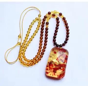 Collier avec pendentif en ambre à fleurs fines pour homme et femme, amulette en ambre de la baltique
