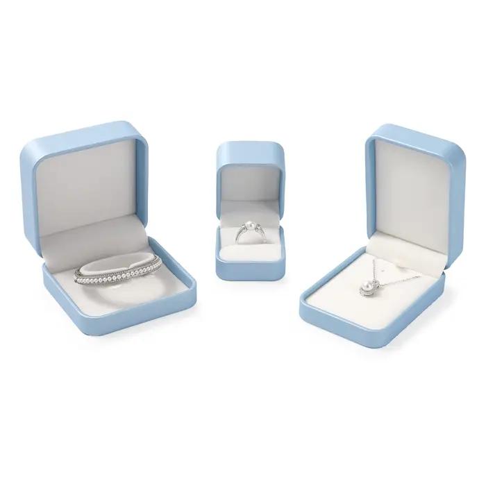 Boîte à bijoux bleue de qualité supérieure avec doublure en velours pour rangement et protection de colliers bagues boucles doreilles et bracelets occasions spéciales famille bijoutier