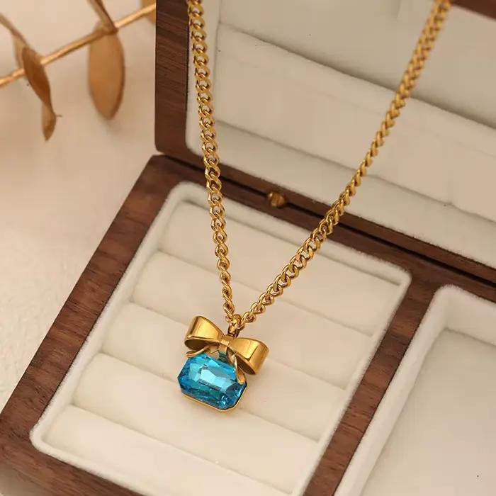 Bijoux Élégants EILIECK - Ensemble Collier Carré à Nœud Papillon, Boucles d'Oreilles, Bague et Bracelet pour Femmes Occasions Spéciales