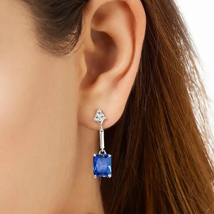 Boucles d'oreilles pendantes en pierres bleues saphir