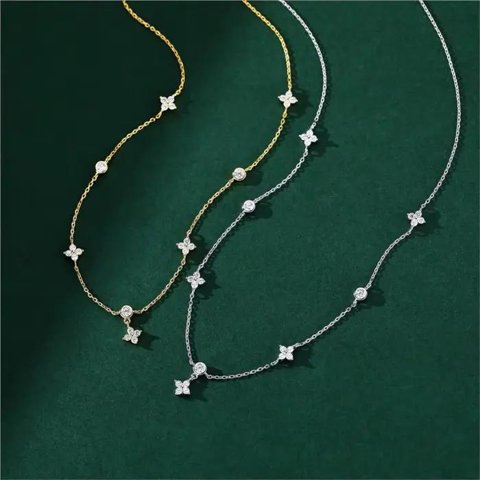 ANENJERY incrusté Zircon quatre feuilles fleur chaîne collier pour les femmes nouvelle Niche lumière de luxe mode chaude colliers ras du cou accessoires