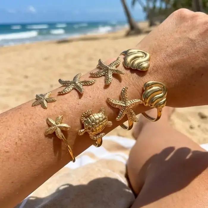 Bracelet en acier inoxydable en forme d'étoile de mer pour femmes