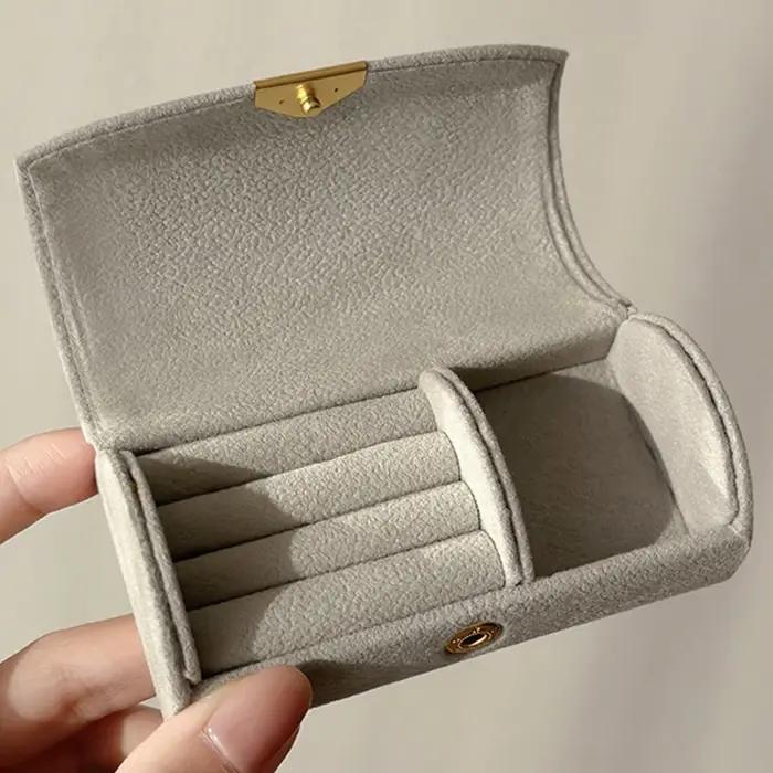Mini boîte de rangement de bijoux Portable exquise pour les voyages d'affaires des femmes
