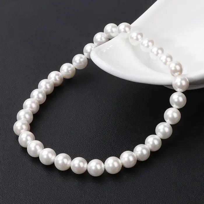 Bracelet élastique en perles de coquillage naturel blanc pour femme