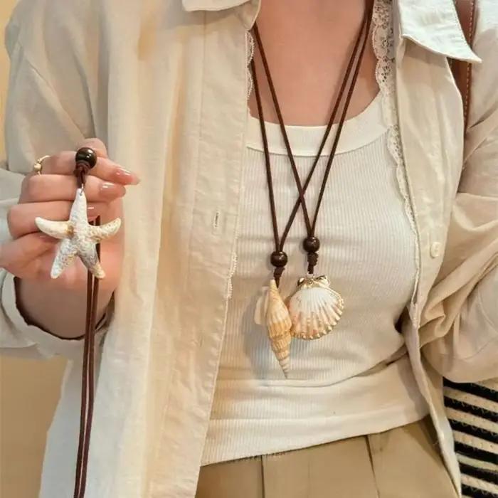 Collier pendentif coquillage style vacances en bord de mer