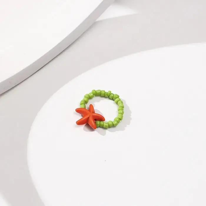 Bague étoile de mer colorée avec perles de rocaille tissées anneau élastique réglable pour filles et enfants bijoux amusants vacances d'été océan fantaisie