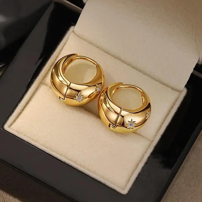Boucles d'oreilles Mango Star en zircone en forme de larme