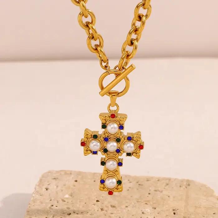 La. Collier et boucles d'oreilles pour femme en acier inoxydable avec pendentif croix incrusté de zircon coloré et de