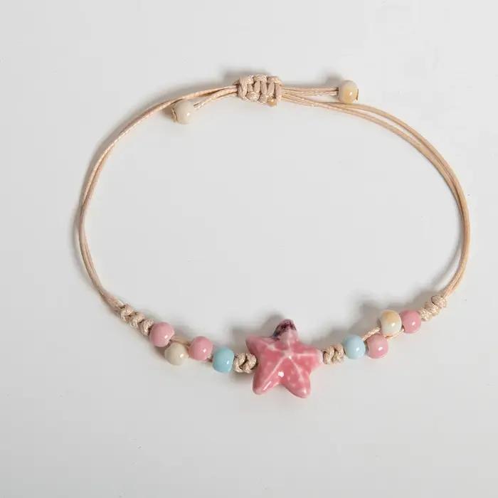 Bracelet en céramique étoile rose fait à la main pour femmes