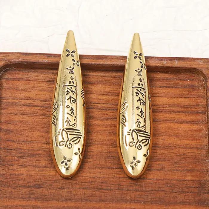 Boucles d'oreilles vintage en alliage de zinc forme goutte d'eau géométrique pour femmes occasions spéciales à offrir elegance glamour
