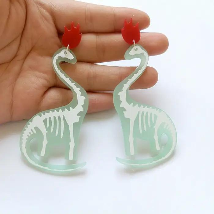 Boucles d'oreilles super longues os de dinosaure pour femmes et filles