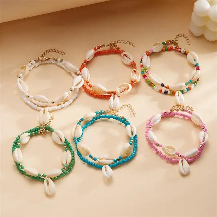Chevillères en coquillages naturels avec perles en résine pour femmes, chaînes de cheville pieds nus pour été et plage, bijoux de pied élégants et originaux