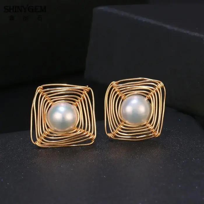 Boucles d'oreilles en perles baroques remplies d'or