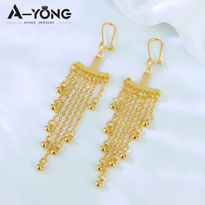 Boucles d'oreilles longues pendantes élégantes de dubaï