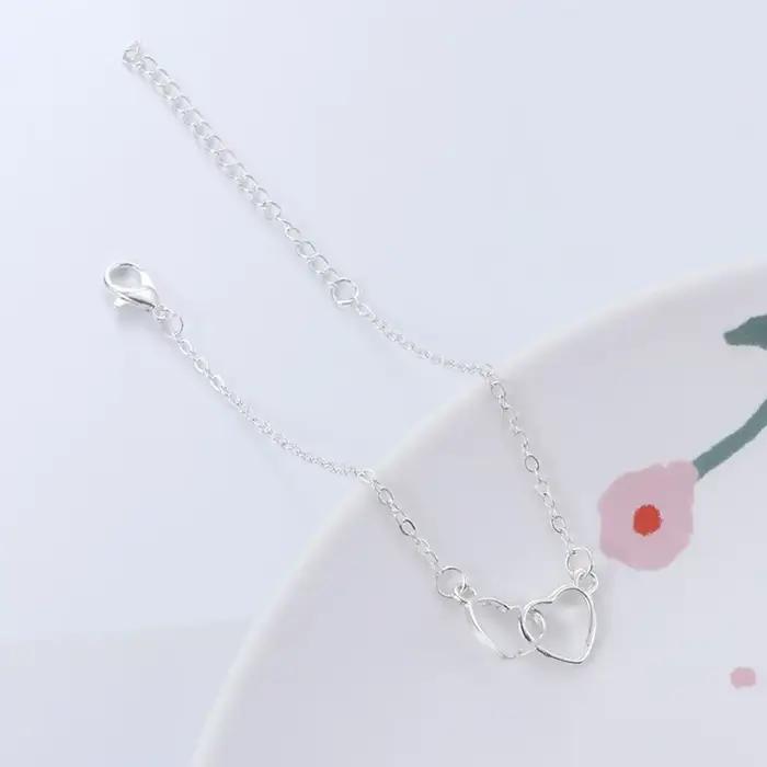 Parure de bijoux en strass : collier et boucles d'oreilles