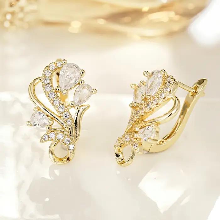 Boucles d'Oreilles Huitan en Forme de U Or Scintillant Fleurs Geometrique Luxe Mariage Zircone Cubique Nouveaux Bijoux Tendance Femme Occasions Spéciales