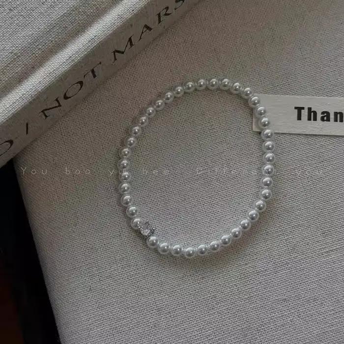 Bracelet à breloques rétro en perles grises et blanches pour femmes, bracelet en Zircon de tempérame