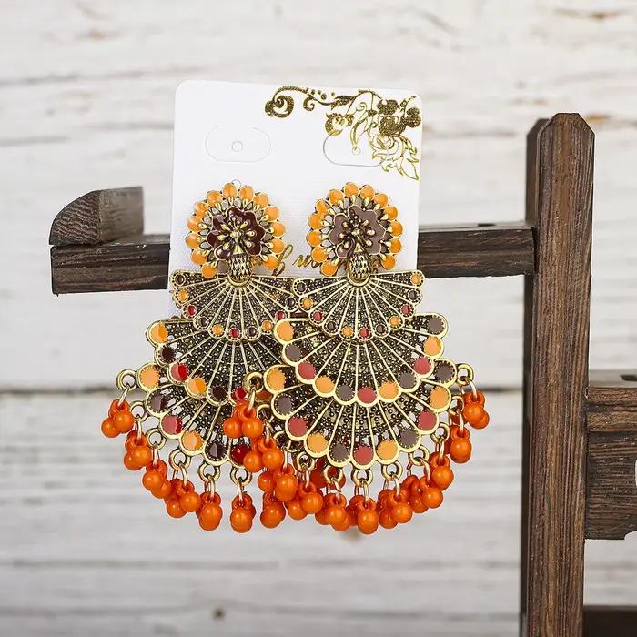 Boucles d'oreilles indiennes en paon rose pour femmes
