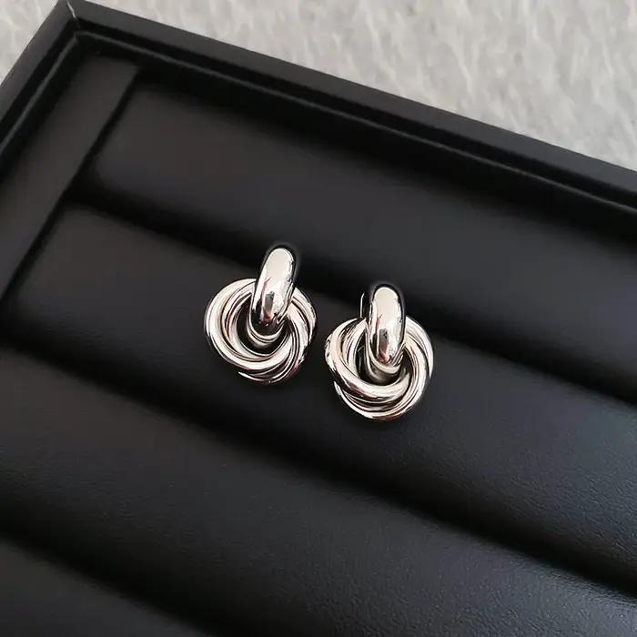 Boucles d'oreilles tendance en acier inoxydable avec nœuds épais pour femmes