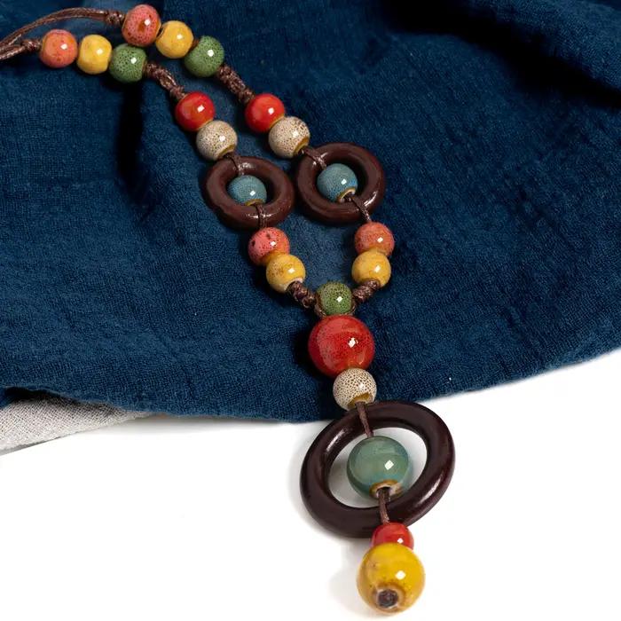 Collier en céramique fait main planète colorée pour femme