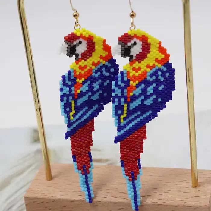 Boucles d'oreilles perlées pour oiseaux de perroquet, boucles d'oreilles en perles de riz, alliage simple, conception originale de Bohême, tricot à la main, marée