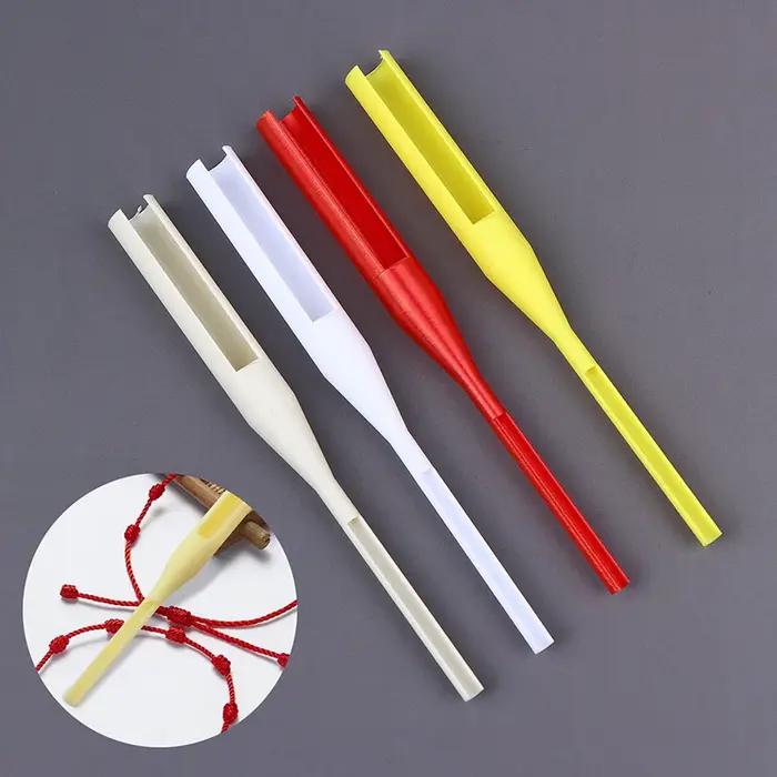 Outils de nouage de cordes roses pour bracelets