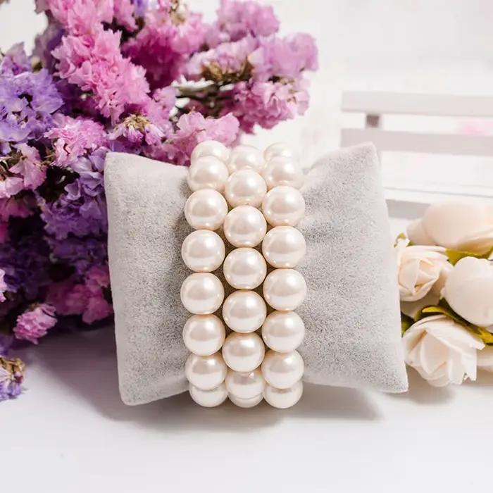 Bracelet classique élégant en perles blanches élastiques pour femmes et hommes